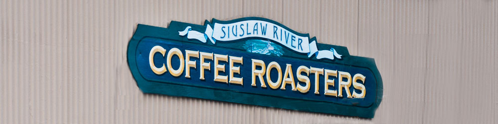 Sign for Siuslaw River Coffee Roasters in Florence